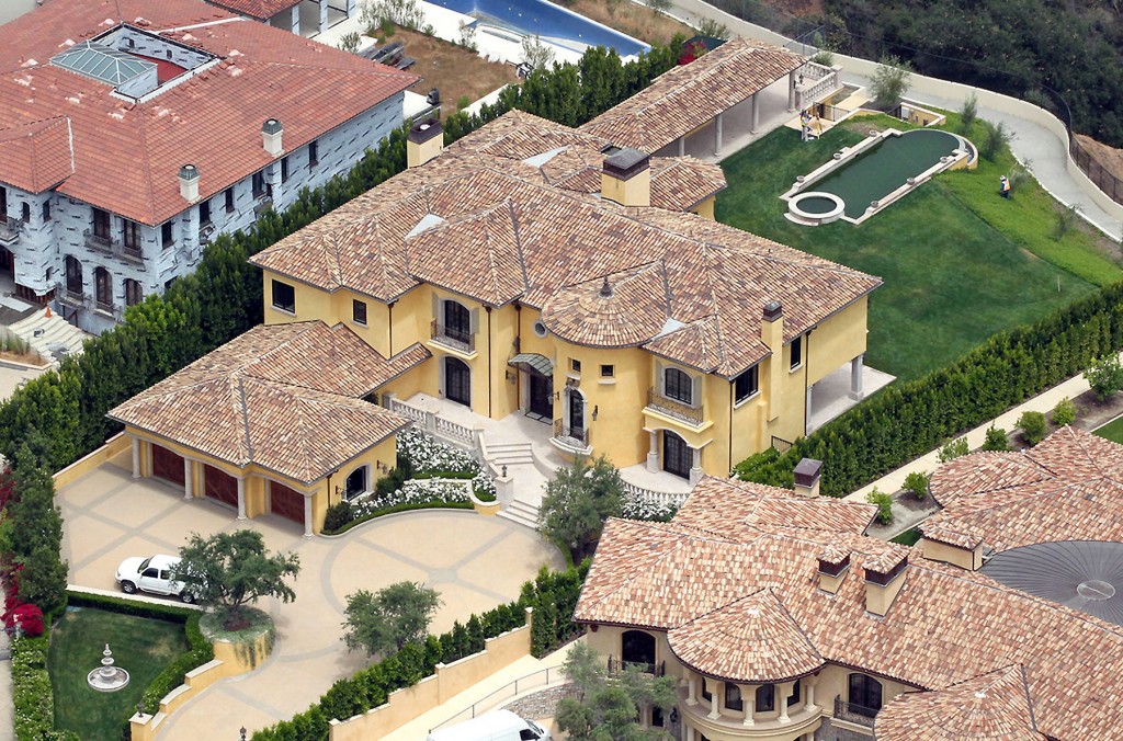 Kim Kardashian and Kanye West have reportedly splashed†out nearly $11 million for this Mediterranean style mansion located in a guard gated community near Bel Air